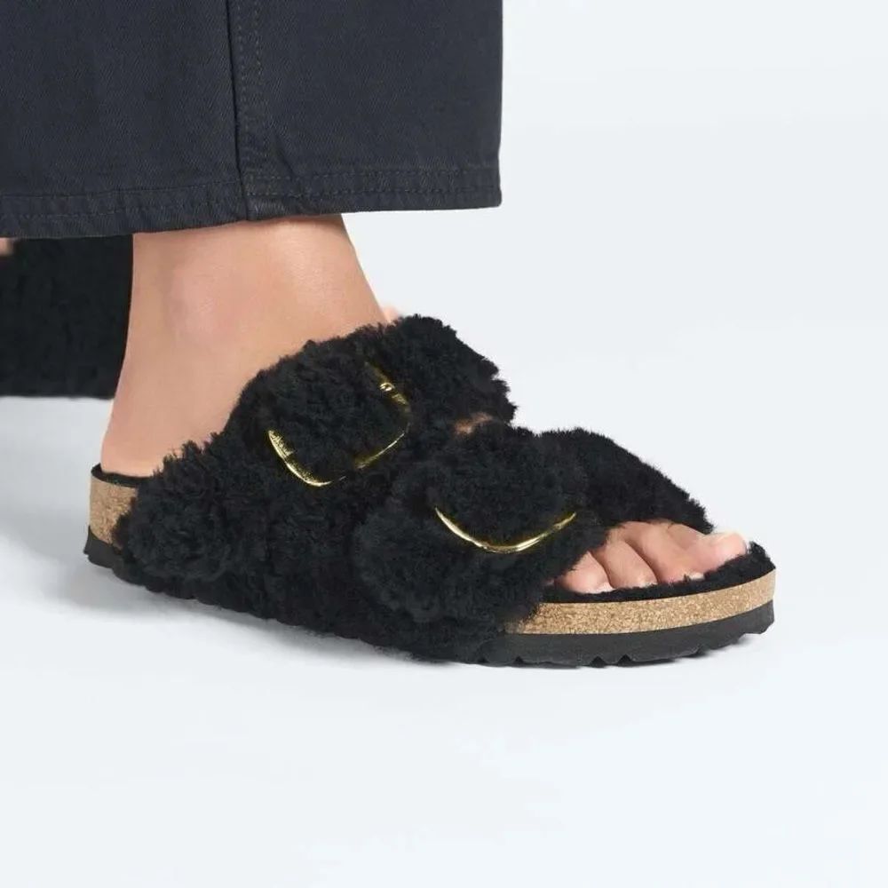 Birkenstock Black Faux Shearling Two-Strap Slide with Gold Buckles